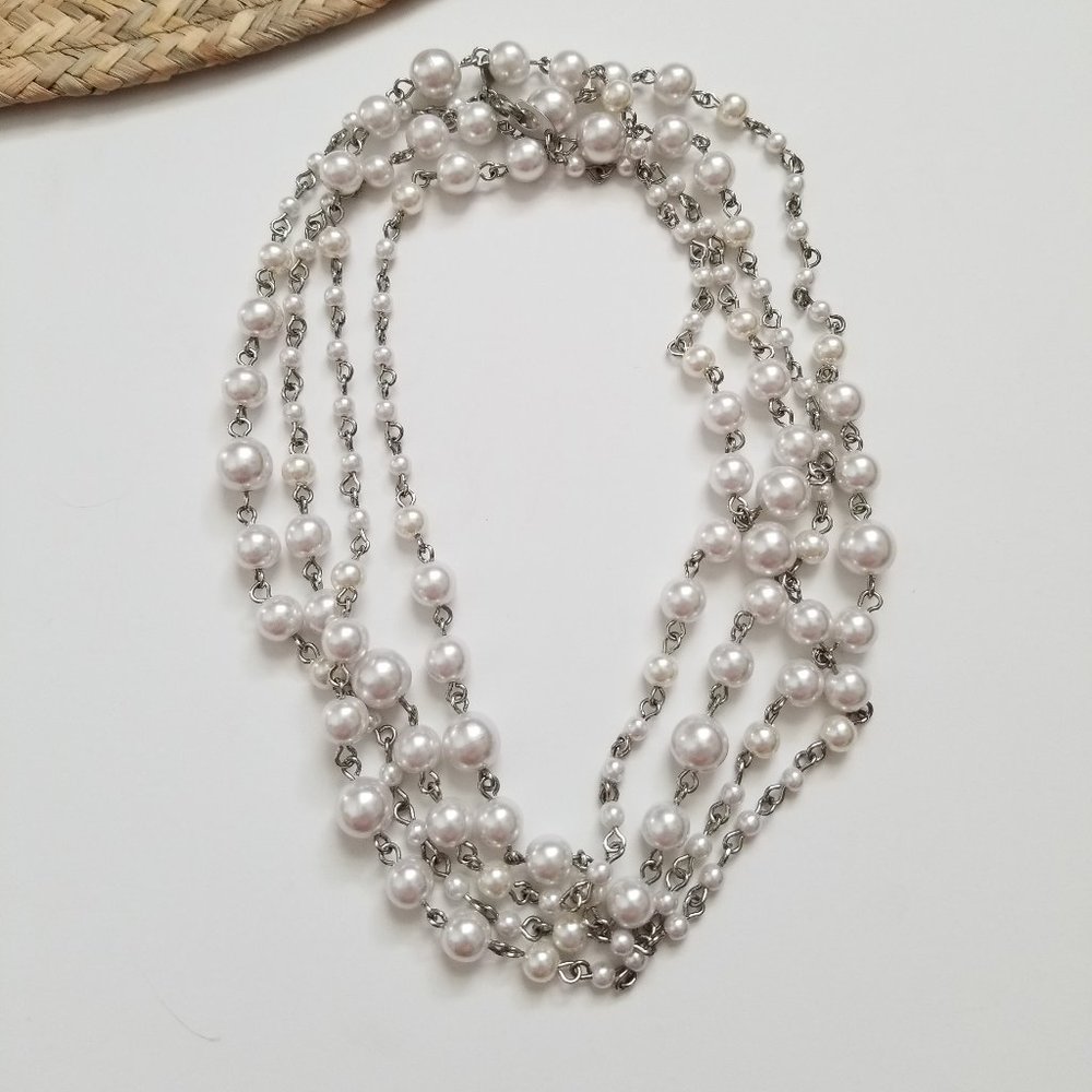 Long, infinity strand faux pearl necklace from Premier Jewelry